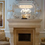 Traditional simple fireplace with venetian mirror