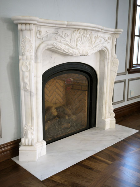 White marble carved mantel