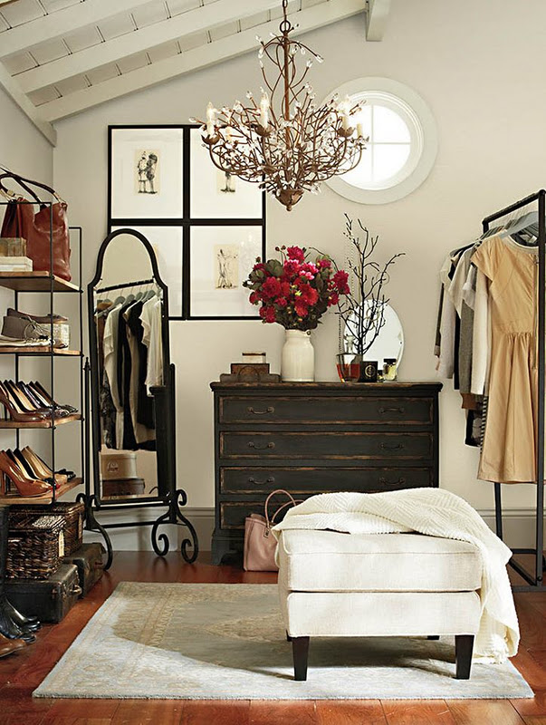 Simple closet with an ottoman