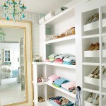 White closet with blue chandelier