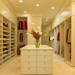 White on White walk in Closet with island