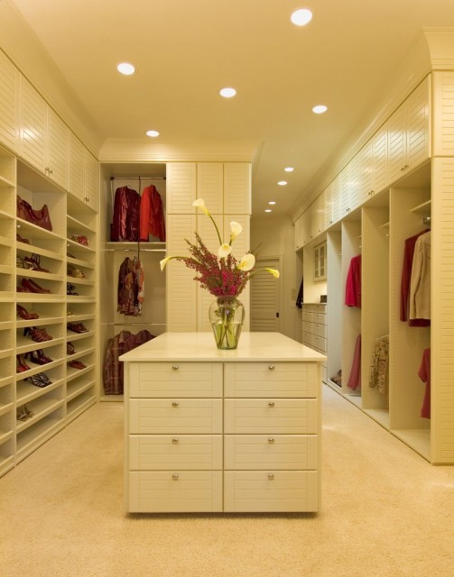 White on White walk in Closet with island